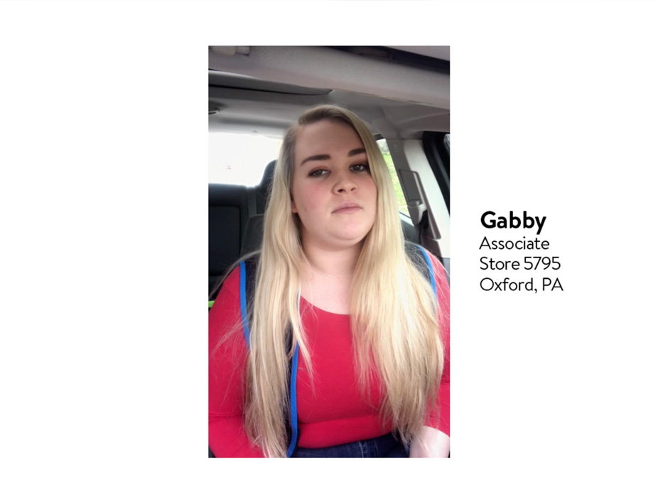 Walmart employee named Gabby sitting in car